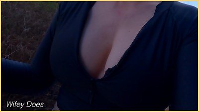 wife public cleavage flashing in a tight shirt with perfect braless tits.